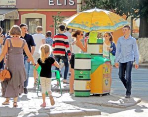 Retail sale of soft drink kvass at summer day on a street crossing